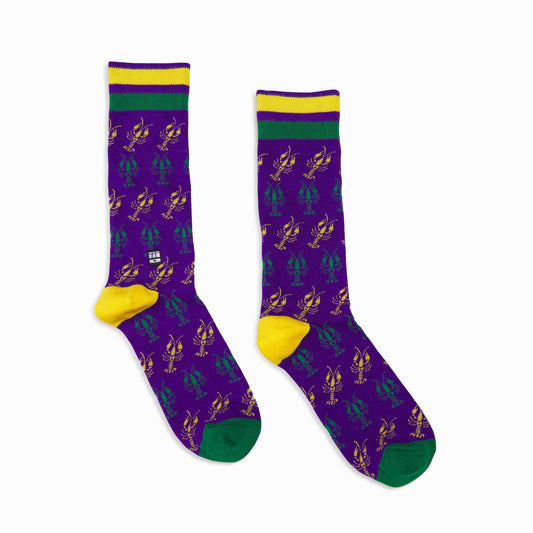 Get ready to march to the beat of your own drum (or streetcar?!) with these Crawfish Mardi Gras socks. . Made with the highest quality materials, these crew/mid-calf socks feature an embroidered Bonfolk signature streetcar logo and a reinforced heel and toe cap for added durability. Plus, the double threaded design and extra tall, double cuff ensure that these unisex adult one-size socks fit most: US men's shoe sizes 5-12 and US women's shoe sizes 6-12.