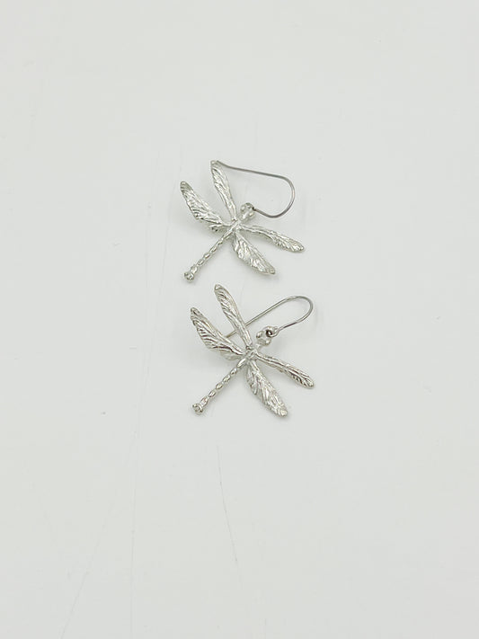 Get ready to spread some wings and fly with these charming Dragonfly Medium Earrings! Made of high-quality pewter with surgical steel findings, these earrings are polished to perfection. With a wing span of 1.25 inches, you'll feel like you're flying high with every wear. Add these beauties to your collection and let your inner dragonfly shine!