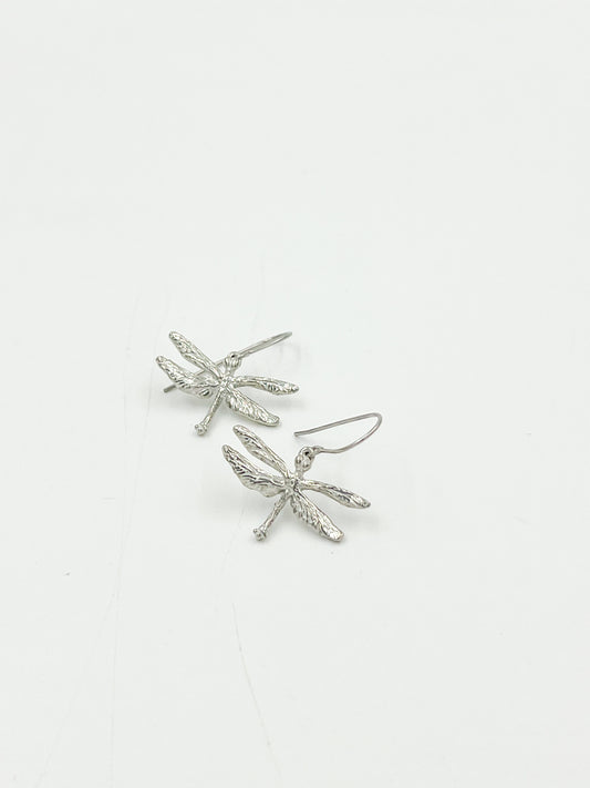 These aren't just any old earrings - they're Dragonfly Tiny Earrings, handcrafted with love by Maurice Milleur Designs and made from highly polished pewter findings and surgical steel wire. Measuring at 0.25″L and weighing only 1 gram, they're perfect for adding a touch of whimsy to any outfit. Made in the USA, of course.