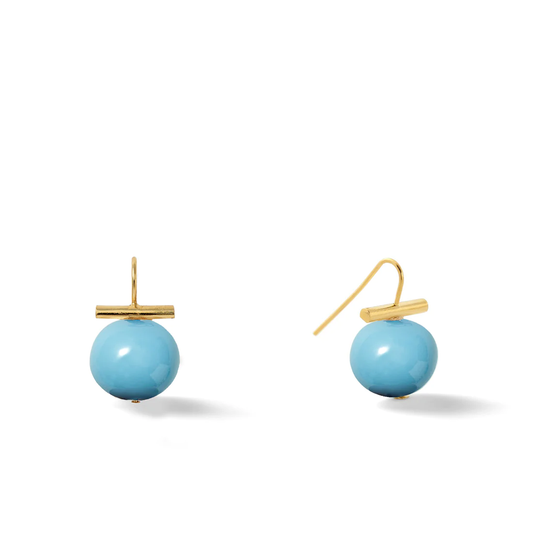 This pair of handmade Pebble Turquoise Pearl Medium Earrings features a 13 X 16mm pebble pearl and a secure hypoallergenic rubber back. The overall length is 7/8” and the earrings have a polished 14 karat gold over brass finish.