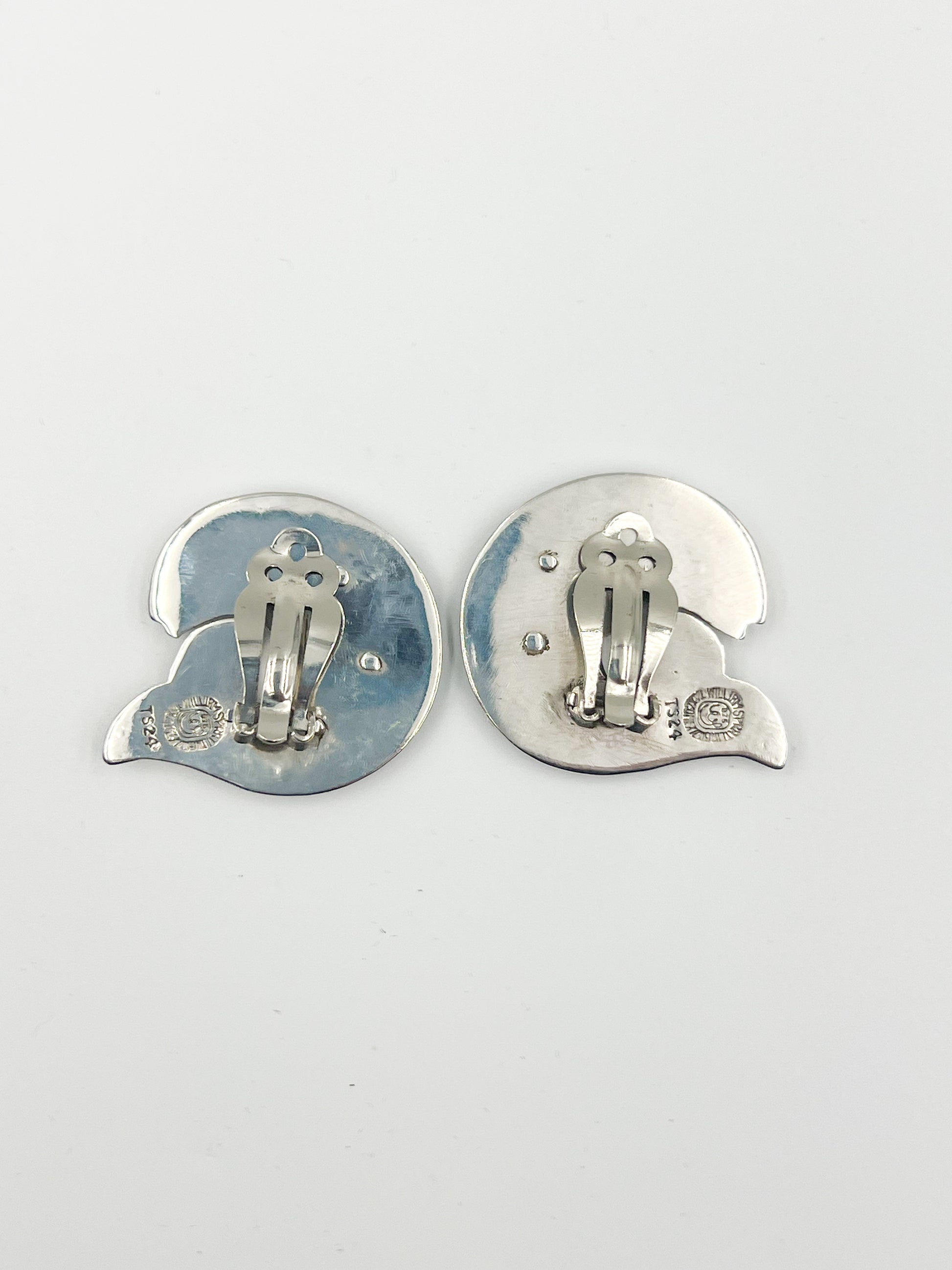 Looking for a fun, quirky earring to add to your collection? Check out the Spratling Silver Fish Clip Earring! Designed with a unique clip clip design, these earrings are one-of-a-kind. Each piece is handmade and carries the current Mexican registry mark TS-24, along with a replica of an older Spratling hallmark. Keep in mind, due to the handmade nature of these earrings, sizes may vary slightly from the photo.